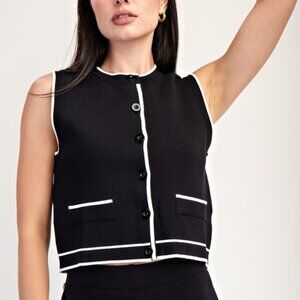 Black Sleeveless Blouse with White Trim